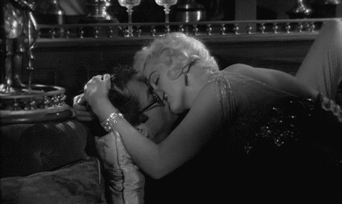 Marilyn Monroe en Tony Curtis: (Only girls are in jazz)